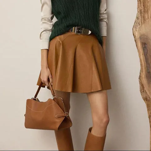 Women's genuine leather skirt - Autumn/Winter New High Waist Short Umbrella Skirt Looks Th | OurHomly